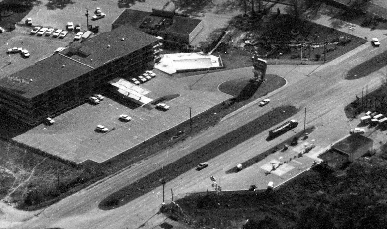 Holiday Inn and American Oil station - 1965